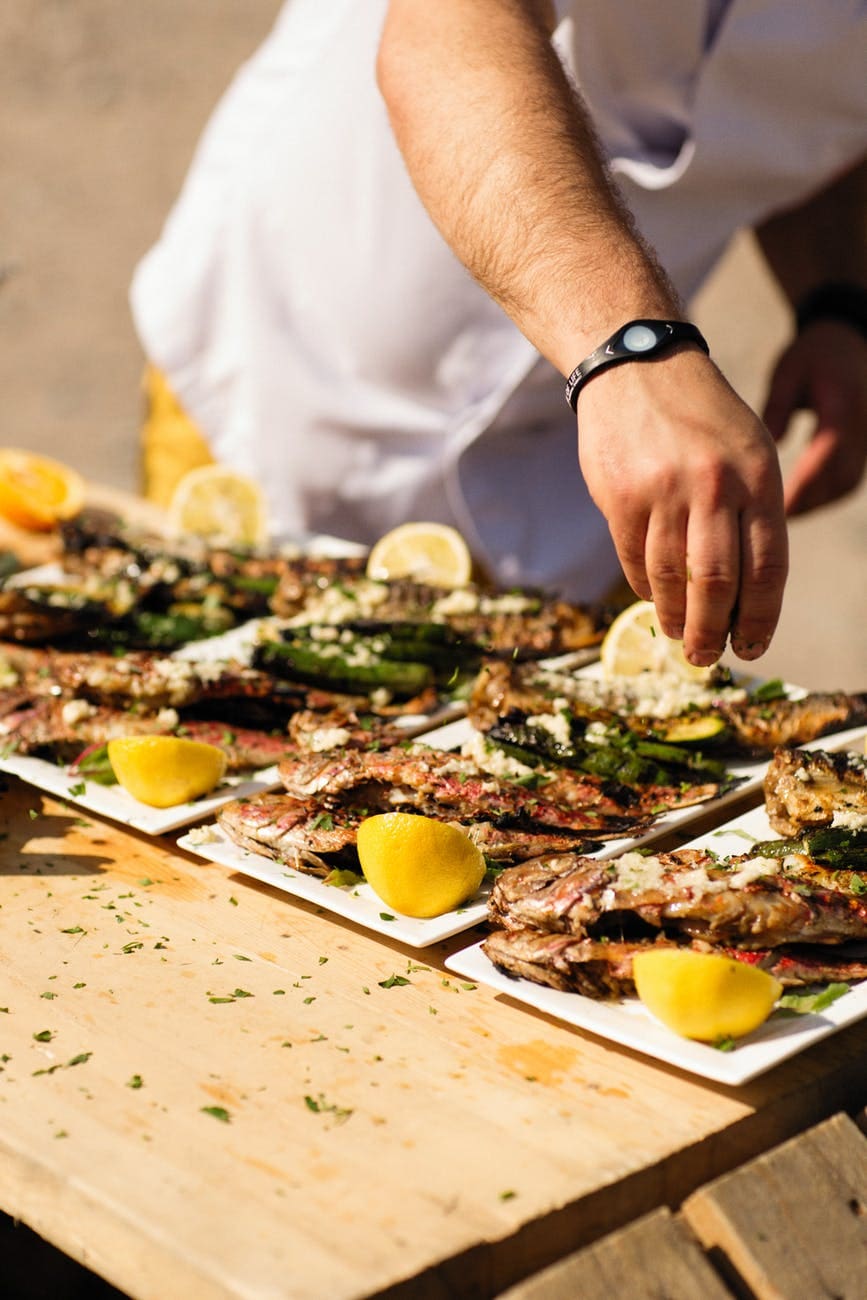 chef preparing fish dishes