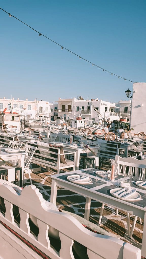 A view of the square with rows of empty tables and chairs