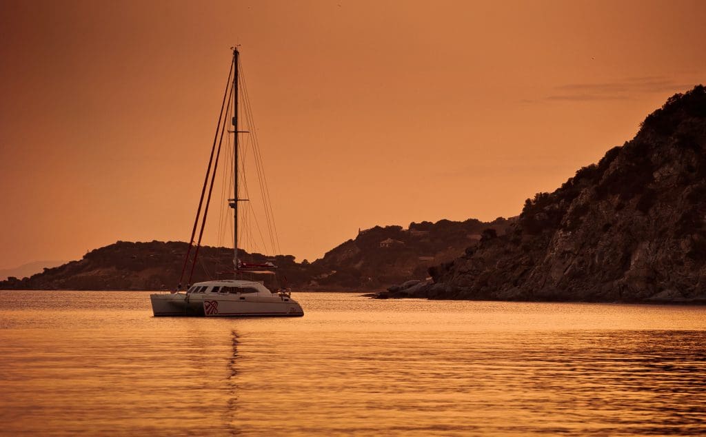 A catamaran at sunset