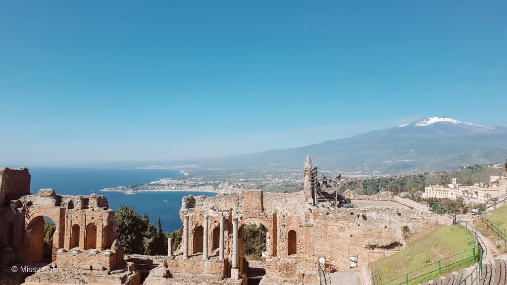 View of Ancient Theatre of Taormina & Mount Etna in the background. 