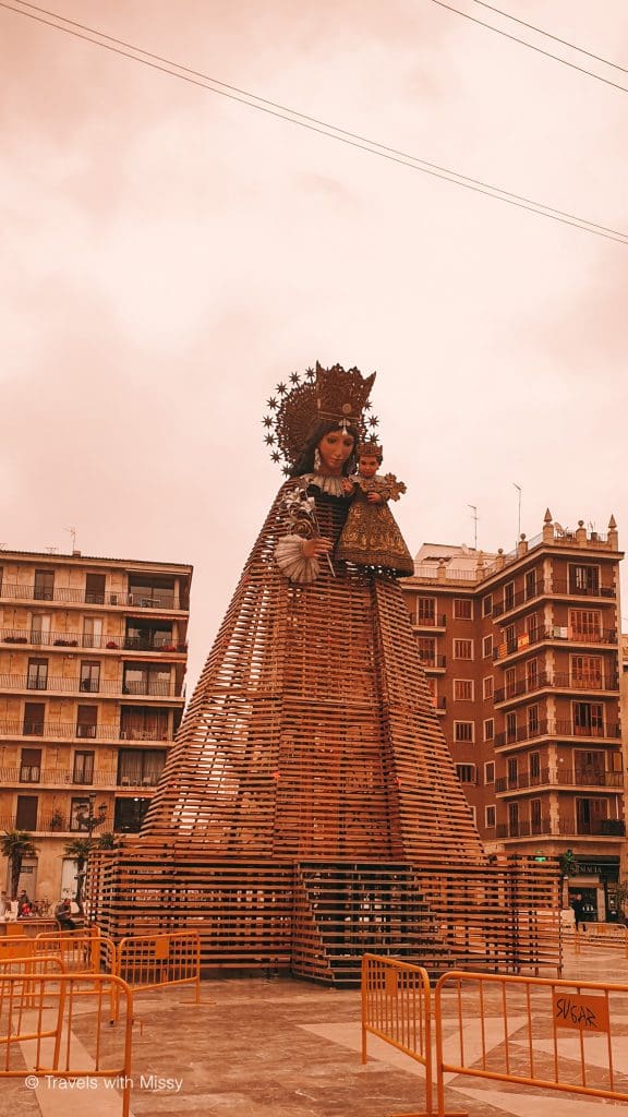 Pictured is a large wooden structure of the Geperudeta, also known as the hunchback is the Patron saint of Valencia. During the Ofrenda of Las Fallas Festival, her skirt will be transformed into a floral arrangement. 