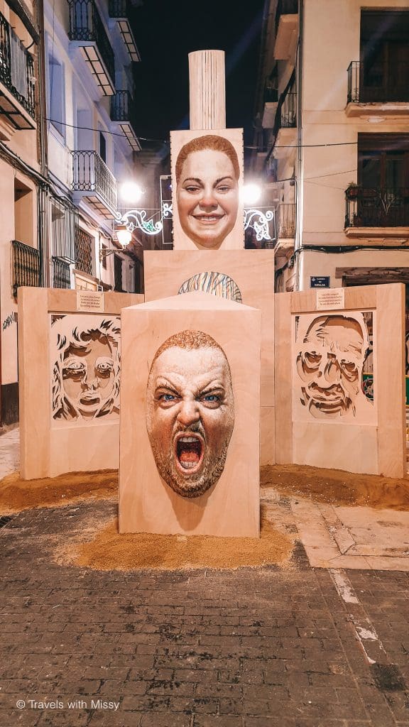 A papier-mache's man's face screams out, one of 4 statues in the Las Fallas festival. 