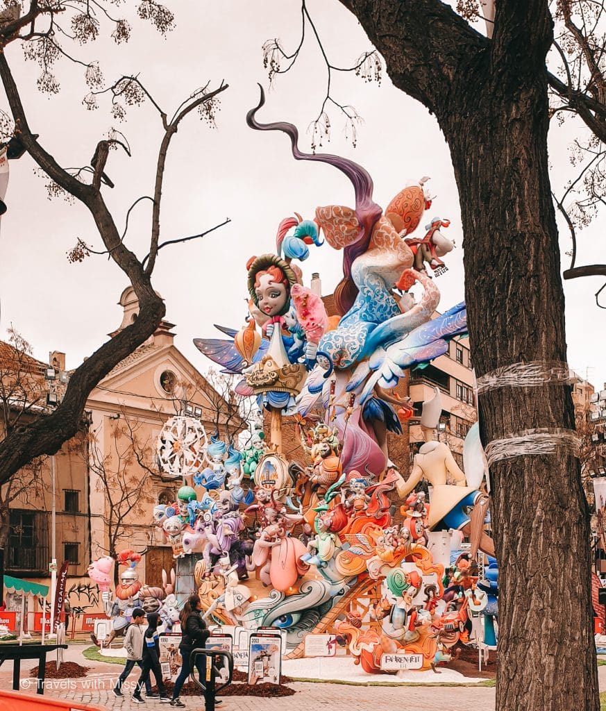 An enormous display of papier-mache ninots and characters soar in a square in Valencia during Las Fallas. 