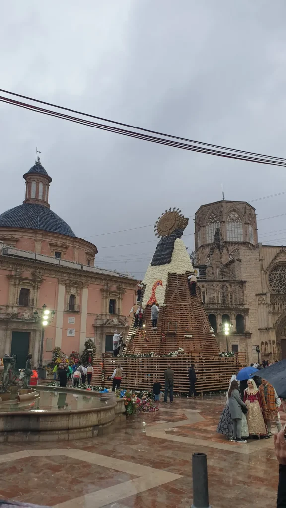 The falleros create a floral dress for the Geperudeta one of the main attractions of Las Fallas.