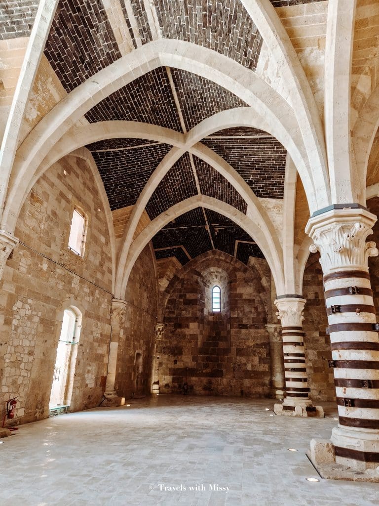 Interior or Castello Maniace that features 16 meter high ceilings and large columns supporting.