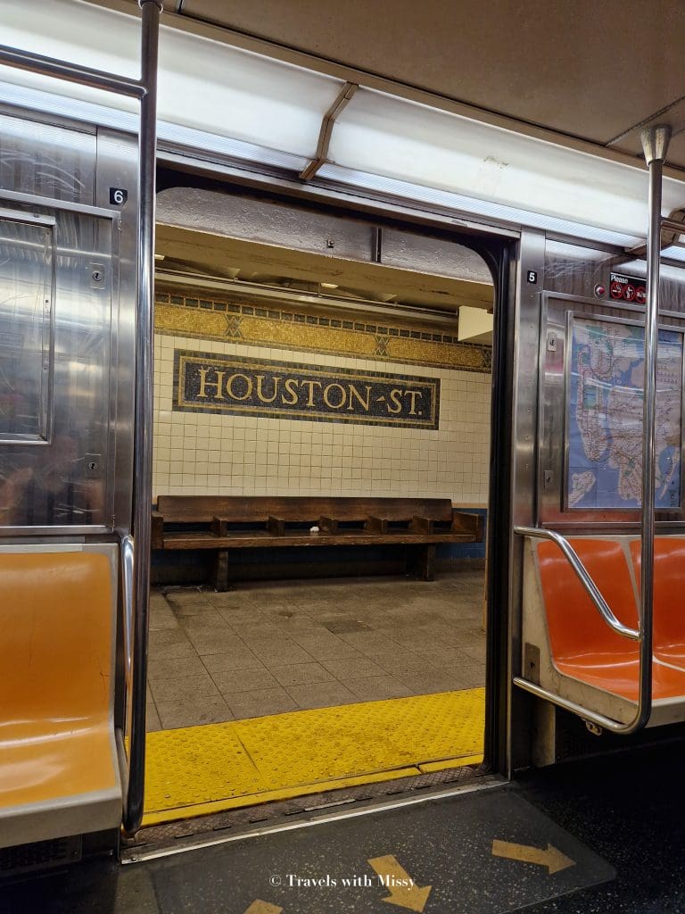 Subway doors open at Houston Street .